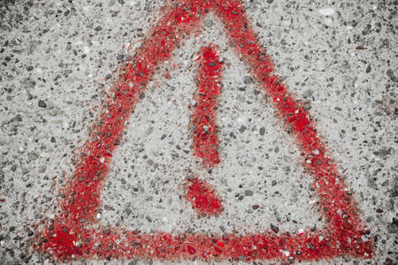 Road sign drawn on the roadの写真素材