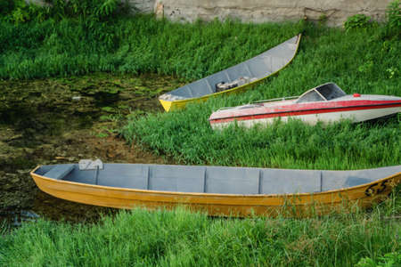 Fishing boats on the grassの写真素材