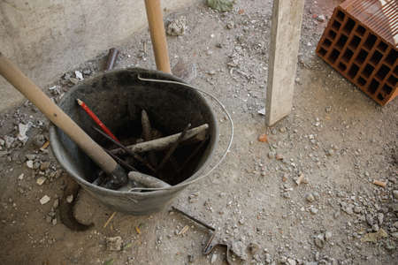 Masonry tools in the bucketの写真素材