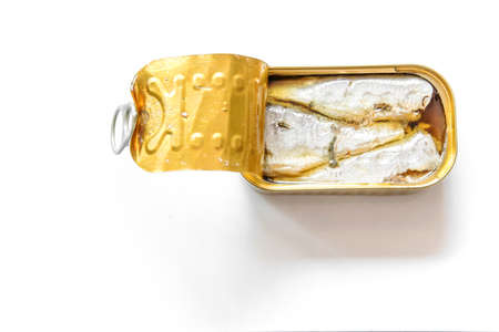 Canned fish on a rustic blue tableの写真素材