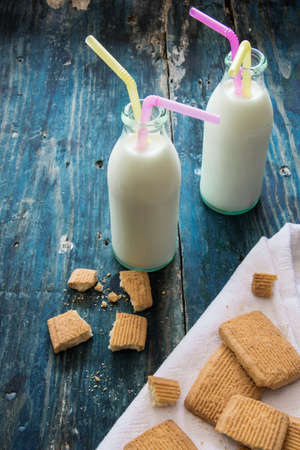 Traditional snacks - milk and cookies for twoの写真素材