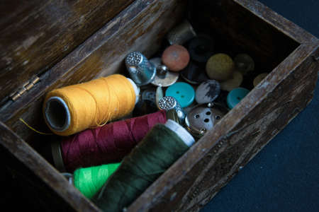 Sewing tools in the antique wooden boxの写真素材