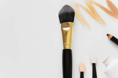 Top view of minimal fashion flat lay, beauty products on white background and space for text