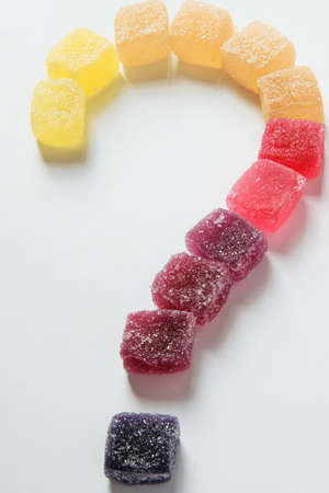 Yummy gummy candies on a white background. Are they really good for healthの写真素材
