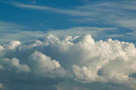 Natural background of fluffy clouds in the sky, space for text