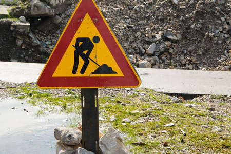 Outdoor street sign - "Under construction"の写真素材