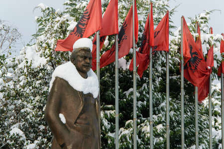 Statue covered with snow of Luigj Gurakuqi - albanian writer and politicianの写真素材