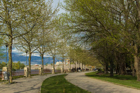 Shkoder/Albania - 04.09.2018: Park avenue in Shkoder with people in backgroundのeditorial素材