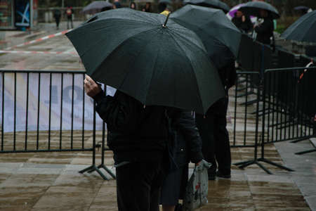 Public event in the rain