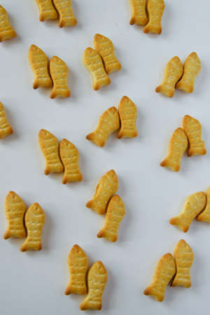 Food pattern- salty snacks/crisps on white background