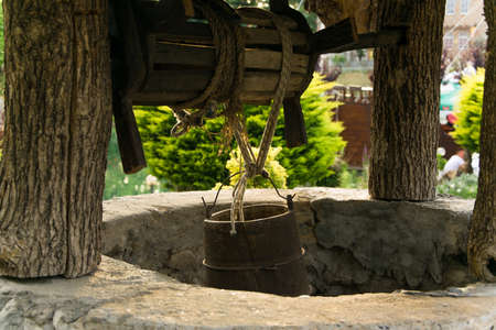 Close up of ancient stone well for waterの写真素材