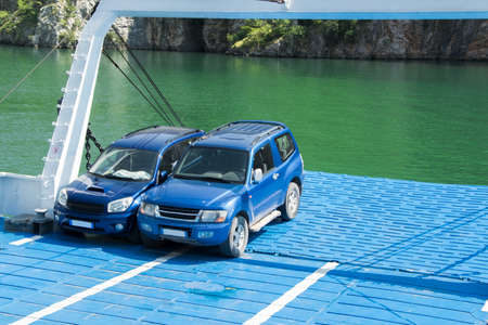 Vehicles parked on the ferry, space for text. Concepts - transportation and travel in security,...