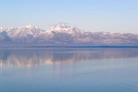 Beautiful scenic landscape  of Shkodra lake, mountains reflection