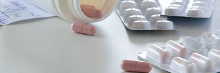 Medicine pills and capsules on white background, space for text. Healthy medical conceptの写真素材