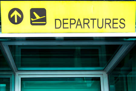 Airport departure sign. Directional sign in abstract modern airport interior