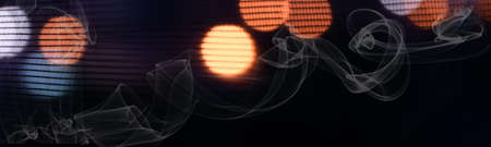 Dark bokeh light background with smoke steamの写真素材