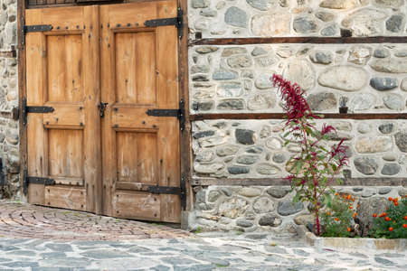 Part of entrance door of traditional Bulgarian house, historic exterior of Balkan constructionの写真素材