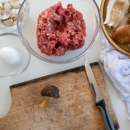 Top view of ingredients for meatballs with porcini mushrooms (edible Boletus)の写真素材