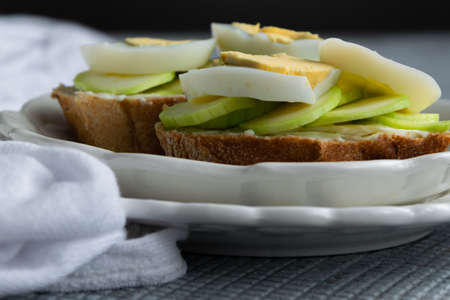 Healthy homemade sandwiches with vegetables and hard-boiled eggs