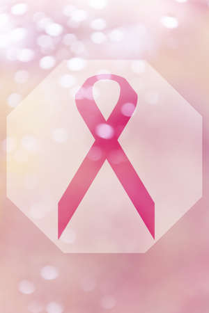 Illustration of pink ribbon on glow background, international symbol of breast cancer awareness.の写真素材
