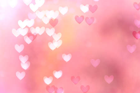 Abstract background with soft pastel colors and heart elements. Glowing backdrop, space for text