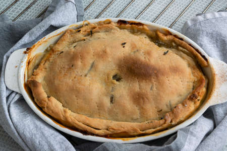 Ready to eat stuffed Italian schiacciata in a baking dish, homemade bakery themes, culinary and food...