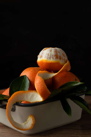 Close up view of citrus fruits on black background. Oranges vitaminic tropical foodの写真素材