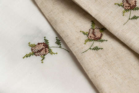 Close up view of the linen napkin with embroidery, piece of vintage calicoの写真素材
