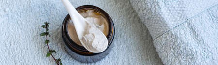 Hygiene bath product. Body, face scrub on towel. Wellness therapy regenerationの写真素材