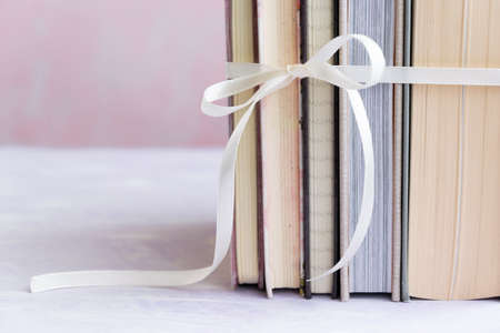 Stack of books tied with a bowの写真素材