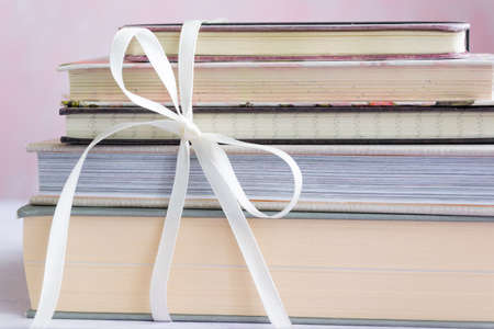 Stack of books tied with a bowの写真素材