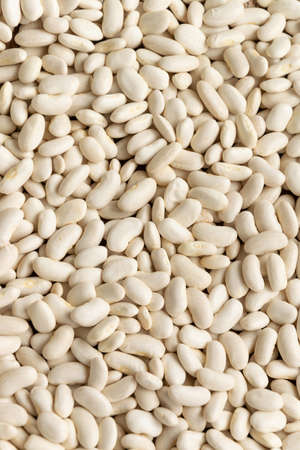 White raw aw beans background. Natural protein legume food