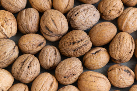 Whole raw walnuts, healthy eating ingredients, vegan and vegetarian food