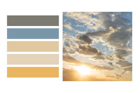 Cloudy skyline background in a colour palette, with complimentary colour swatchesの写真素材
