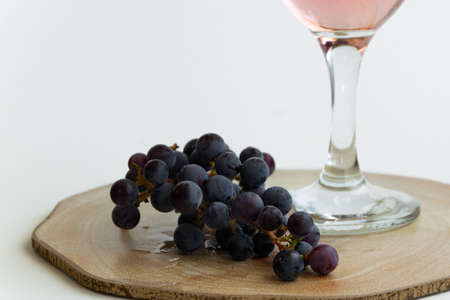 Isolated grape and wine. Alcoholic beverage product, space for textの写真素材