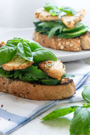 Ready to eat sandwich with grilled chicken meat and basil pestoの写真素材