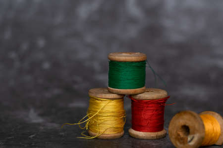 Different colorful cotton mill on gray backgroundの写真素材