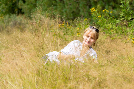 Senior woman in nature. Outdoor healthy lifestyleの写真素材