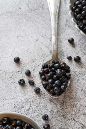 Fresh picked blueberries on table, healthy seasonal raw fruits