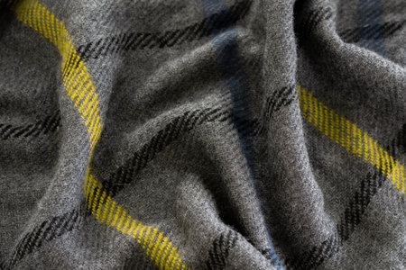 Woolen cloth, gray and yellow colors, pattern texture backgroundの写真素材
