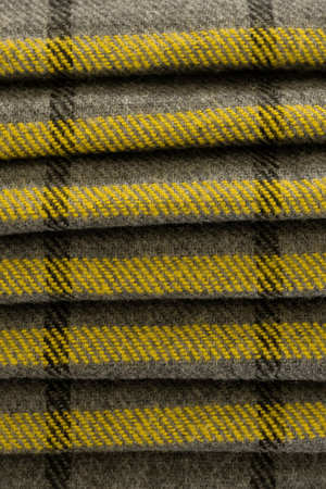 Woolen cloth, gray and yellow colors, pattern texture background