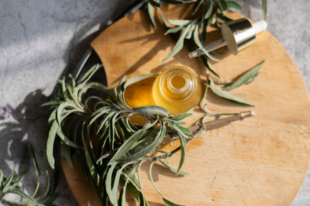 Essential oil with sage leaves extract. Hygiene bath product. Wellness therapy regenerationの写真素材