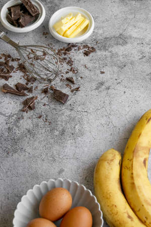 Ingredients for making banana bread. Sweet homemade dessert item, bakery themesの写真素材