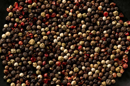 Close up view of mixed peppercorn seedsの写真素材