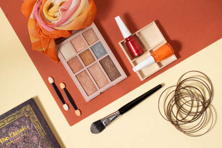 Cosmetic flat lay in warm colors, feminine themesの写真素材
