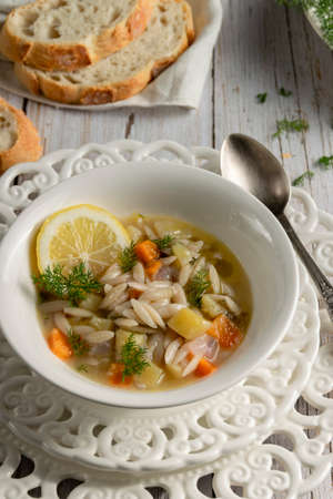 Vegetable soup. White rustic food photography, cottage stylingの写真素材