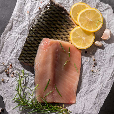 Sliced fillet of fresh carp fish, food ingredientsの写真素材