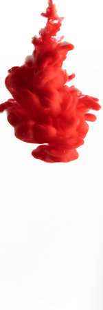 Red color flowing in smoke forms, smooth abstract moving by acrylic paintの写真素材