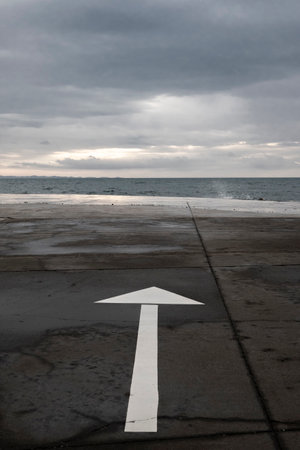 Arrow on the asphalt, space for textの写真素材