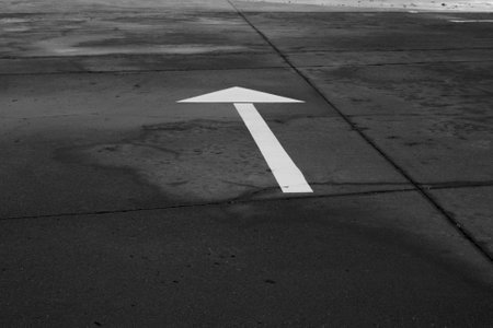 Arrow on the asphalt, space for textの写真素材